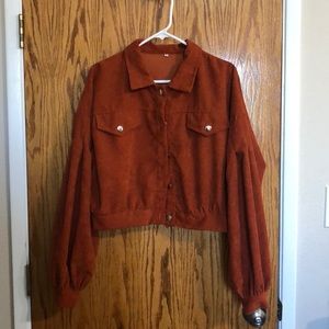 burnt orange woman’s outerwear jacket